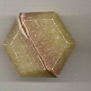 Calcit orange Feenstein mit braunen Einschlüssen