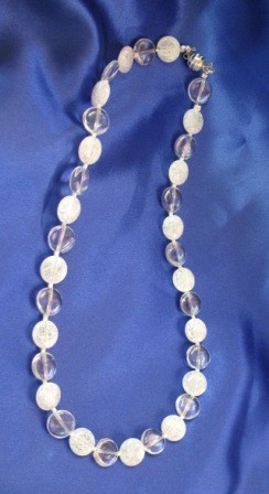 Iris Kristall und Bergkristall Disc 5x12mm in einer Länge von 48cm